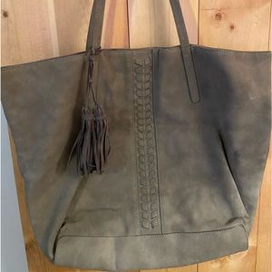 Imitation suede tote with accent braid design.